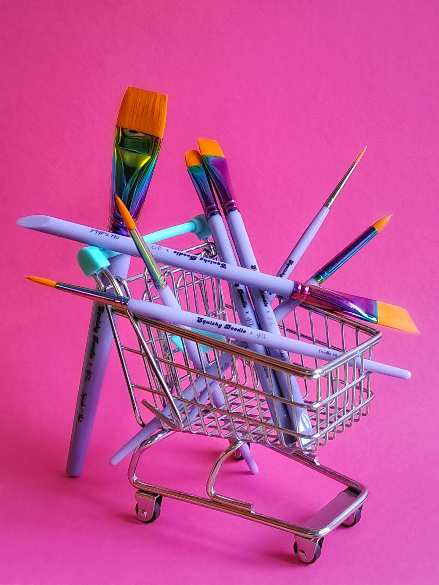 Squishy Doodle x GTX face paint brushes in a tiny shopping cart